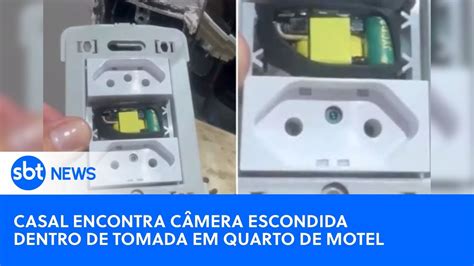 camera escondida no motel|Vídeo: Casal encontra câmera em tomada de motel de GO e。